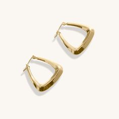 The 18K Gold Plated Gracie Hoop Earrings. A brand new addition that's already proving to be a timeless classic here at Midas. A beautifully sculpted shape, inspired by trips to Morocco. These really compliment every outfit and frames every face perfectly, why not face the day with these by your side? When you're not wearing this piece, tuck it away in your very own Milou jewellery box provided. Stainless Steel, plated with 18K Gold Waterproof (Tarnish Resistant) Natural Linen Milou Jewellery Box Timeless Small Hoop Earrings For Everyday Elegance, Chic Polished Finish Hoop Earrings As Gift, Chic Polished Finish Hoop Earrings For Gift, Chic Polished Hoop Earrings As Gift, Timeless Small Hoop Tarnish Resistant Earrings, Timeless Small Hoop Earrings For Everyday, Timeless Small Hoop Gold-plated Earrings, Classic Gold-plated Hoop Earrings, Timeless Hoop Earrings For Everyday Elegance