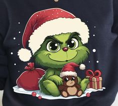 a person wearing a christmas sweater with a cartoon character on it and a teddy bear