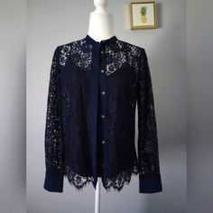 This Beautiful J Crew Blouse Is A Must-Have For Any Fashion-Forward Woman. The Navy Blue Color And Floral Lace Accents Add A Touch Of Elegance To Any Outfit. The Blouse Features A Collared Neckline, Long Sleeves, And Regular Sleeve Type, Making It Perfect For All Seasons. Brand J Crew Color Blue Lace Style Blouse Size 2 Brand New Without A Tag.. 2 Piece Armpit To Armpit 20 Inch Longest 25 Inch Size Medium Long Sleeves 24 Inch Polyester And Spandex Buttons Front Colors May Vary Colors May Vary Cu Ruffle Shoulder Top, Lace Peplum Blouse, Long Sleeve Wrap Top, Poplin Top, Velvet Blouses, Lace Peplum, Dolman Sleeve Tops, Chambray Top, Leopard Print Blouse