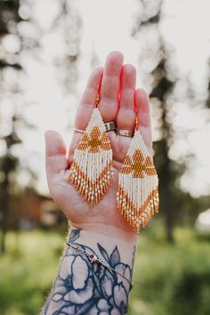 Bohemian Cream Jewelry With Ear Wire, Handmade Cream Dangle Earrings, Handmade Cream Drop Earrings, Cream Beaded Dangle Earrings, Cream Beaded Dangle Jewelry, Cream Bohemian Earrings As A Gift, Cream Bohemian Earrings As Gift, Adjustable Cream Dangle Earrings, Adjustable Cream Drop Earrings