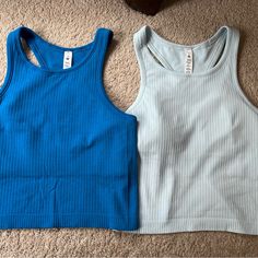 Lululemon Ebb To Street Tank Tops Padded Turquoise Size 4 And Light Blue Size 6 Never Worn Blue Seamless Activewear For Spring, Spring Blue Seamless Activewear, Blue Tank Top For Light Exercise In Summer, Blue Tank Top For Summer Exercise, Light Blue Casual Workout Tank Top, Light Blue Casual Tank Top For Workout, Casual Blue Tops For Light Exercise, Light Blue Athleisure Tops For Light Exercise, Blue Casual Go-dry Tank Top