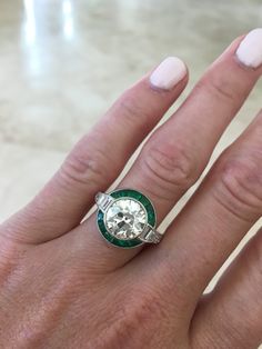 Liz Legg Jewelry: Art Deco style diamond ring with calibre emerald halo Diamond And Emerald Ring, Art Deco Rings, Jewerly Art, Deco Rings, Art Deco Emerald, Bijoux Art Nouveau, Black Tungsten Rings, Sterling Silver Jewelry Handmade, Ring Ideas