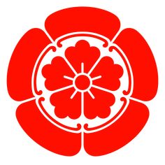 a red flower with four petals in the center on a white background, it looks like an ornament