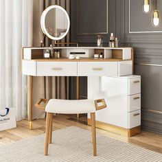 a dressing table with a mirror and stool in front of a curtained window next to a white rug