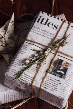 an old newspaper wrapped in twine and tied with twine on top of it