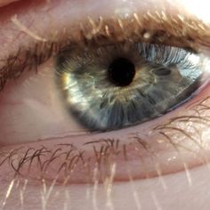 an extreme close up shot of the iris of a person's eye