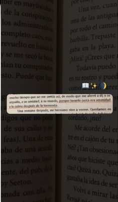 an open book with the words in spanish on it and a yellow star at the bottom