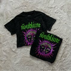 Sublime T-Shirt Unisex Size Small (Fit True To Size) New Without Tags. Dead Stock Tee, Straight From Retailer. Never Worn. Perfect Condition. Regular Fit, Full Length, Crewneck With Short Sleeves. Washed Black/Gray Vintage Style With Green And Pink Graphic Print On Front. 100% Cotton. If You Have Any Questions Feel Free To Ask:) If You Don’t Like The Price Please Send An Offer:) * All Bundle Orders Are Discounted * All Orders Are Packaged With Care And Have Same Day Or Next Day Shipping Green Cotton T-shirt By Urban Outfitters, Urban Outfitters Green Cotton T-shirt, Black Relaxed Fit T-shirt By Urban Outfitters, Urban Outfitters Black Relaxed Fit T-shirt, Black Graphic Tee By Urban Outfitters, Urban Outfitters Summer Text Print T-shirt, Urban Outfitters Summer Letter Print T-shirt, Urban Outfitters Text Print Tops For Streetwear, Green Casual T-shirt By Urban Outfitters