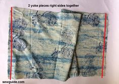 two pieces of blue and white fabric with drawings on them