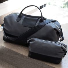 When a work trip or weekend travel time arrives, pack the essentials in this versatile travel set crafted of luxurious vegan leather. With the way you live today in mind, the luxe and relaxed duffle design has an interior pocket, satin lining and a removable shoulder strap so it can quickly switch gears as a gym bag. The toiletry bag has the space to keep all your grooming supplies smartly organized. Max Toiletry Bag Made with vegan leather with polybag lining. Zipper closure. Imported. Max Duffle Bag Made from vegan leather with a satin lining. Features a removable shoulder strap, 2 carrying handles and interior pocket. Zipper closure. Imported. Quick Weekend Getaways, Work Trip, Luggage Organization, Weekend Travel, Live Today, Max Black, Travel Time, Travel Set, Pottery Barn Teen