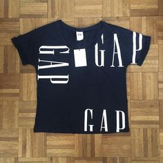 New With Tags, 100% Cotton Gap Navy And White Loose Boxy T-Shirt. Measurements: Pit To Pit About 20in, Shoulder To Hem About 22in Gap Short Sleeve Tops With Letter Print, White Graphic Print Top By Gap, White Gap Tops For Streetwear, White Gap Tops With Graphic Print, Gap Relaxed Fit Top With Graphic Print, White Graphic Print Tops By Gap, Gap Tops For Summer Streetwear, Casual Streetwear Tops By Gap, Gap Graphic Tee With Crew Neck