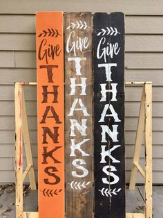 two wooden signs that say give thanks and give thanks