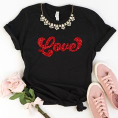 "Valentines Day Shirt for Women, Red Glitter Love Shirt, Womens Valentines Day Shirts, Ladies Valentines T-shirts, Valentines Gifts for Wife HOW TO ORDER 1. Select the size and color of the shirt you would like to order. 2. Add the quantity of shirt(s) you would like and then click \"Add to Cart\" 3. Submit Order 4. During checkout please provide any additional information in the \"Note to Seller\" section. If you forget, just send me a message on Etsy after your order is completed. VALENTINES D Trendy Red T-shirt For Party, Red Letter Print Shirt For Gift, Valentine's Day Gift T-shirt With Text Print, Red Short Sleeve T-shirt For Party, Red Casual Party T-shirt, Red Casual T-shirt For Party, Casual Red T-shirt For Party, Casual Red Shirt For Valentine's Day, Red Cotton Party T-shirt