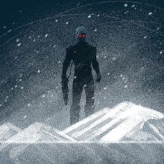 a man standing on top of a snow covered mountain under a red light in the dark