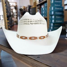 A straw hat that is great for looking sharp while getting down at the rodeo. Brim 4" Crown 4 3/8" Cattleman Crown Bangora straw hat Made in Mexico Stallion Collection by Stetson Lacquered firm finish Style SSBLLY-7342 Stetson Straw Hats, Hat Making, Straw Hat, Rodeo, Cowboy Hats, Straw, Cowboy, Crown, Hats