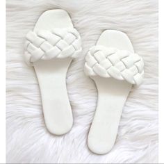 Slide Into Summer With Style In These Darling Braided Sandals From Qupid! This Is The Hazy-142 One Band Braided Slide Sandals In Bright White. They Feature A Thick Braided Upper Design, A Cushioned Footbed And A Flat Sole. The Faux Leather Is Silky And Buttery Soft And Perfect For All Day Wear. Effortless And Comfortable, These Sandals Pair Perfectly With Any Look! Brand: Qupid Style Hazy-142 White Str Pu Color: White Faux Leather Material Size Runs True To Size. White Flat Heel Jelly Sandals For Vacation, Trendy White Jelly Sandals With Flat Heel, White Slide Jelly Sandals For Spring, White Closed Toe Synthetic Jelly Sandals, White Closed Toe Jelly Sandals, Trendy White Flat Heel Jelly Sandals, White Adjustable Jelly Sandals For Spring, White Slide Jelly Sandals For Beach, White Flat Sandals For Summer Outings