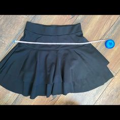 Brand New Black Skirt Black Stretch Tiered Skort, Black Short Tennis Skirt For Party, Black Fitted Tiered Tennis Skirt, Black Pleated Tiered Skort, Fitted Black Tiered Skort, Black Tiered Pleated Skort, Black Tiered Skort For Night Out, Black Lined Tennis Skirt For Night Out, Black Relaxed Fit Tiered Skort