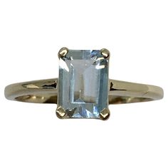 14 Karat Yellow Gold Aquamarine Lady's Ring Finger size 6 Weighing 2.1 gram 7 mm by 5 mm Emerald cut Aquamarine In very good condition, see pictures Green Aquamarine Ring For Gift, Rectangular Aquamarine Ring For Gift, Yellow Gold Aquamarine Rings For Gifts, Blue Emerald-cut Aquamarine Diamond Ring, Aquamarine Cabochon Ring, Ring Finger, Emerald Cut, Solitaire Ring, Aquamarine