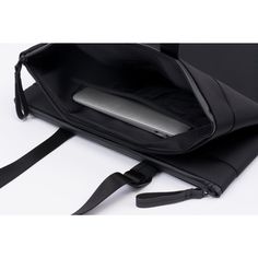 The SALM is a stylish tote that can be carried by hand, or over the shoulder, tucked under the arm. Two separate zippered compartments allow you to organise your laptop, documents and belongings. Made from black 100% Nylon with a silky feel. [Details] Composition: 100% Nylon Height: 44cm Width: 38cm Color: Black Shape: Tote (18 Litre) Features: Water Resistant, Expandable Compartment, Padded Device Pocket All Black Everything, Laptop Pocket, World Of Fashion, Water Repellent, Camera Bag, New Product, Satchel, Water Resistant, Composition