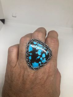 Large genuine blue Turquoise Vintage ring Low content silver not sterling. Size 10 Can be re sized at my jeweler. $10-$20 All rings are shipped free in the US in a nice gift box. Check out our over a THOUSAND great reviews Engraving is $4 per letter and is not always perfect depending on the piece. It can take a few days if the jeweler is busy. This is payable to Paypal Judithsltd@gmail.com Southwestern Style Blue Nickel-free Rings, Southwestern Style Turquoise Jewelry For Gifts, Southwestern Style Blue Jewelry With Large Stone, Southwestern Blue Jewelry With Large Stone, Southwestern Blue Open Ring Jewelry, Southwestern Style Blue Open Ring Jewelry, Southwestern Nickel-free Jewelry As Gift, Southwestern Blue Large Stone Jewelry, Nickel-free Southwestern Style Jewelry As Gift