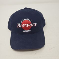 New With Tags Vintage Milwaukee Brewers Snapback Baseball Hat One Size Fits All/Most No Manufacturer Warranty Implied or Given Please view all pics as they are a part of the listing.  We happily combine shipping on multiple items to save you money.  If the combined shipping quote seems high, email BEFORE PAYING and we will weigh everything together/give an accurate quote.  Please visit our store, Mainely Bargains, for more items like this. **We are a non smoking environment but do resell from va Team-colored Curved Bill Baseball Cap For Baseball Season, Adjustable Flat Bill Team-colored Baseball Cap, Adjustable Team-colored Flat Bill Baseball Cap, Team-colored Snapback Baseball Cap For Fans, Baseball Snapback, Milwaukee Brewers Baseball, Milwaukee Brewers, Mlb Baseball, Sell Items