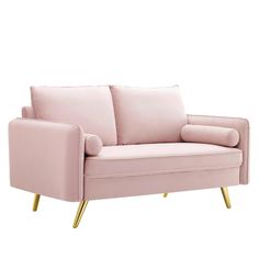 a pink couch with gold legs on a white background