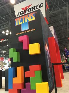 an exhibit booth with colorful blocks on display