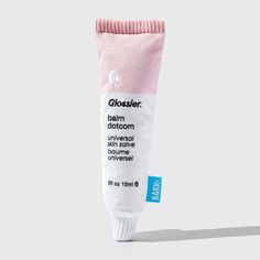 a tube of glycosler balm toothpaste on a white background