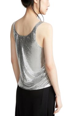 Detailed with logo-engraved snaps, Paco Rabanne's sleeveless top is composed of polished silvertone metal mesh.The shimmering material is a celebrated signature of the label.Scoopneck. Logo-etched silvertone snaps.Snap closure at side.Silver.100% aluminum.Hand wash.Made in France. Glamorous Silver Tank Top For Party, Glamorous Silver Party Tank Top, Silver Sequined Tank Top, Silver Tank Top For Party, Silver Sleeveless Tank Top For Night Out, Silver Sleeveless Top For Night Out, Elegant Metallic Tank Top For Party, Glamorous Silver Tank Top For Night Out, Glamorous Silver Sleeveless Tops