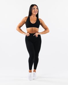 HIGHLIGHTS. Seamless construction Rib panel for support Low to Medium impact Moisture-wicking breathable fabric Flattering scoop neckline FIT SUGGESTION. This item runs true to Alphalete's standard seamless fit.. If you are between sizes, we recommend sizing up.. Model is 5’2”/157.5cm, wearing a size XS with a 34.5”/87.6cm bust. MATERIALS AND WASHING DIRECTIONS. 51% Polyamide, 38% Polyester, 11% Elastane. We recommend washing inside-out on a cold setting. Hang to dry DESCRIPTION With the beloved High Stretch Scoop Neck Activewear For Light Exercise, Black Compressive Scoop Neck Activewear, Black Scoop Neck Sports Bra For Gym, Stretchy Activewear For Light Exercise With Scoop Neck, High Stretch Activewear For Light Exercise With Scoop Neck, Scoop Neck Stretch Activewear For Gym, Black Compression Activewear With Scoop Neck, Stretch Activewear With Scoop Neck For Sports, Black Functional Sports Bra With Scoop Neck