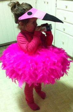 DIY flamingo costume ! Pink suspenders, pool ring, feather boas, pink tights, pink turtleneck, micheals pink foam visor, fuzzy leg warmers and pink dish gloves for feet :) Pink Flamingo Costume, Halloween Dvd, Martha Stewart Halloween, Flamingo Party