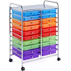 a multicolored cart with many drawers and a clock on the top one side