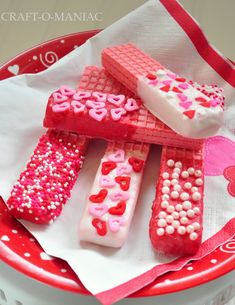 valentine's day treats on a red and white plate