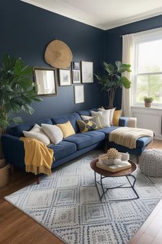 a living room with blue walls and white rugs on the floor, large potted plant in corner