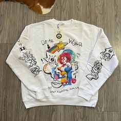 Limited Edition Fewocious Nft Artist Collaboration For Madhappy Super Soft White Fleece Crewneck Sweatshirt With All Over Hand Painted Print Design By Fewocious Size M Oversized Fit Matching Shorts Available Winter White Sweatshirt With Graffiti Print, White Long Sleeve Sweatshirt With Graffiti Print, White Cotton Sweater With Graphic Print, White Long Sleeve Top With Graffiti Print, Oversized White Sweater With Graphic Print, White Graphic Print Sweater For Winter, Multicolor Fleece Crew Neck Top, White Graphic Print Sweater For Fall, White Graffiti Print Top For Fall