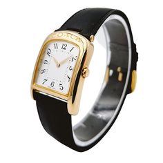 Ladies Coach 26mm Gold Plated Watch with Genuine Black Leather Band and White Dial. NEW / Unworn SN# 500**** Brand: Coach. Model: W501. Case Back: Solid. Metal: Gold Plated. Bezel: Gold Plated. Gender: Women's. Dial Color: White. Case Dimensions: 19mm. Condition: Excellent Condition. Bracelet / Strap: Black Leather. Movement: Quartz (Movement). Bracelet Size: Measures 7.50" (inches). Box / Paper: Includes Original Coach Box. Warranty: One (1) Year Limited Service Warranty. Classic Adjustable Watches With Polished Finish, Classic Leather Watch Accessories For Office, Elegant Coach Watch With Polished Finish, Classic Watch Bands With Polished Finish, Classic Business Watches With Bracelet Strap, Elegant Gold Leather Watch Bands, Luxury Gold Coach Watch Accessories, Classic Leather Watch Bands With Polished Finish, Rectangular Leather Strap Watch Bands