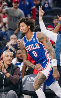 the philadelphia 76ers player is celebrating after his team's win