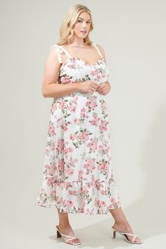 Summer looks are meant to be effortless, like the Villa Garden Eyelet Midi Dress! With eyelet embroidery throughout, this adorable dress shapes shoulder tie tank straps and a princess-seamed bodice with a sweet heart neckline and lightly flared. You can wear this dress to your next tea party and create a beautiful look! - Sleeveless- Eyelet- Smocked- Lined- Color: Ivory MultiSize + Fit - Model is 5'9" and wearing size 2X- Measurements taken from size 2X- Chest: 21 1/2"- Length: 45" Fabric Self:9 Sundress With Ruffles And Sweetheart Neckline For Garden Party, Sleeveless Dresses With Adjustable Straps For Garden Party, Garden Party Sundress With Tie Back And Ruffled Straps, Garden Party Dress With Tie And Ruffled Straps, Sweetheart Neckline Dresses With Delicate Straps For Garden Party, Feminine Garden Party Dress With Tie Straps, Sleeveless Sundress With Adjustable Straps For Garden Party, Sundress With Sweetheart Neckline For Garden Party, Spring Dress With Sweetheart Neckline And Tie Straps