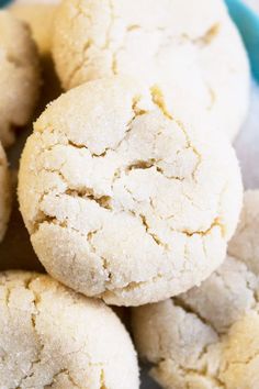 a pile of cookies sitting on top of a blue bowl