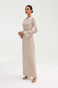 Introducing the Ella Ribbed Split Cuff Maxi Dress, a luxurious and versatile addition to your wardrobe. Made with ribbed fabric for a comfortable and stretchy fit, this dress features a split cuff detail and pairs perfectly with an abaya. Elevate your style and make a statement with this elegant and exclusive piece. Model is 5'7 wearing size XS/58" Malaysia Outfit, Modest Dress Outfits, White Coat Ceremony, White Dress Formal, Church Fits, Nikkah Dress, Modesty Outfits, Maxi Dress White, Ootd Inspo