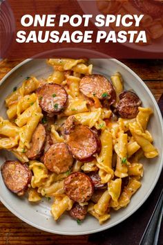 One Pot Spicy Sausage Pasta is pan-seared andouille smoked sausage, campanelle pasta, and a creamy, cheesy, spicy sauce. One Pot Smoked Sausage Pasta, One Pot Smoked Sausage, Italian Sausage Recipes Pasta, Spicy Pasta Recipes, Andouille Sausage Recipes, Campanelle Pasta, Bologna Recipes, Creamy Sausage Pasta