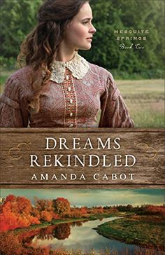 a book cover for the novel dreams re kindled by amanda cabot, featuring an image of a woman with long hair