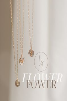 Honor the beauty and meaning of your birth flower with this dainty pendant. A keepsake that will never go out of style. Includes one 14k gold plated birth flower pendant + 14k gold-filled Figaro chain Pendant measures approx. 10x14mm Your choice of chain length (16"+2" extender or 18"+2" extender) All materials are lead & nickel free Handmade with love by Luna & Jade in the U.S. Dainty May Birthstone Necklace With Birth Flower Detail, Dainty May Birthstone Flower Necklace, Minimalist Birth Flower Necklace Keepsake, Gold Flower-shaped Jewelry With Birthstone, Dainty Birth Flower Jewelry For Keepsake, Delicate May Birthstone Jewelry, Dainty 14k Gold Filled Birth Flower Necklace, Delicate Jewelry With May Birthstone And Birth Flower, Gold Flower Necklace For May Birthstone