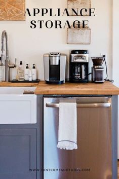 there is a kitchen with an appliance on the wall above the dishwasher