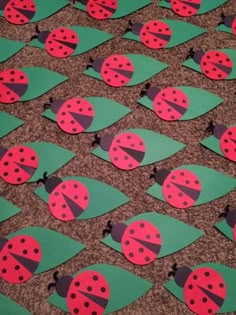 ladybug paper cut out to look like they are sitting on top of each other