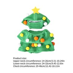 a green christmas tree with yellow and orange balls on it's head, sitting next to a white background