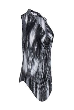 Unleash your wild side with this Helmut Lang cowl neck top in black, white, and dark grey muted snakeskin print. Perfect for a night out or a fun date night, this sleeveless top will add a playful and unexpected touch to your outfit. Pair with your favorite leather pants and bold pumps for a daring look! Size S Made in USA 100% Viscose Cowl neckline Sleeveless 'U' shaped hem Bust 36" Waist 34" Shoulder to hem (longest point) 33" Black Cowl Neck Top For Night Out, Black Cowl Neck Top For Party, Black Cowl Neck Top For Evening, Cowl Neck Top, Cowl Neckline, Snakeskin Print, Helmut Lang, Cowl Neck, Date Night