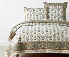 the comforter is neatly made and ready to be used in this bedding set