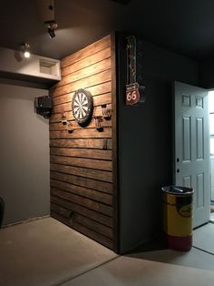 a dart board mounted to the side of a wooden wall