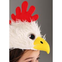 Why Did The Chicken Cross the Road?To get the best Halloween candy, of course! Your kiddo will be running around the neighborhood like a — well, forgive the phrase — chicken with its head cut off when they get to strut around this Halloween in this awesome Chicken Plush Headband & Tail Kit! It's so fun to be a chicken, they may never want to return to their human form. Because chickens get to sit in the sun and peck at food all day long. They get to hang out in the coop with their fun chicken fr Chicken Headband, Best Halloween Candy, Awesome Chicken, Chicken Plush, Chicken Hats, Chicken Costumes, Cow Ears, Candy Station, Family Theme